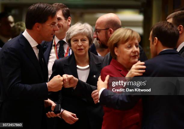 Britain's Prime Minister Theresa May looks on as Netherlands' Prime Minister Mark Rutte, Belgian Prime Minister Charles Michel, German Chancellor...