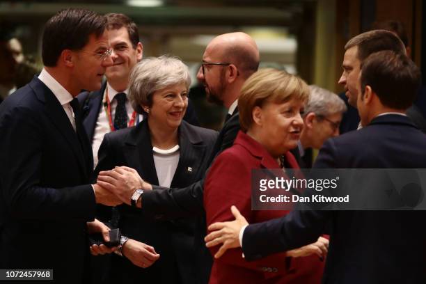Britain's Prime Minister Theresa May looks on as Netherlands' Prime Minister Mark Rutte, Belgian Prime Minister Charles Michel, German Chancellor...
