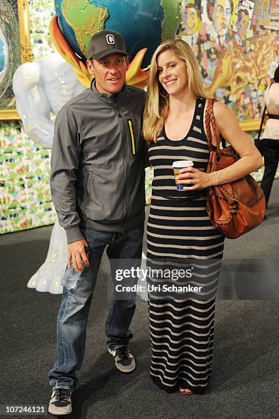 Lance Armstrong and Anna Hansen are sighted at Art Basel Miami Beach at the Miami Beach Convention Center on December 1, 2010 in Miami Beach, Florida.