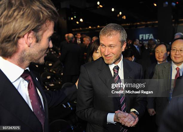 England 2018 Ambassador David Beckham congratulates Roman Abramovich of the winning Russia bid during the FIFA World Cup 2018 & 2022 Host...