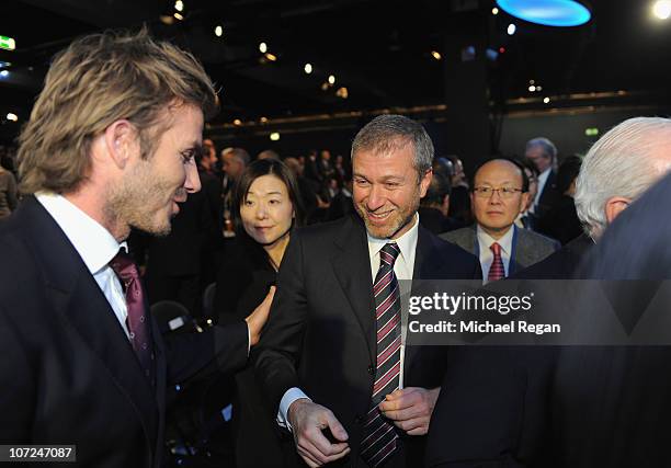 England 2018 Ambassador David Beckham congratulates Roman Abramovich of the winning Russia bid during the FIFA World Cup 2018 & 2022 Host...