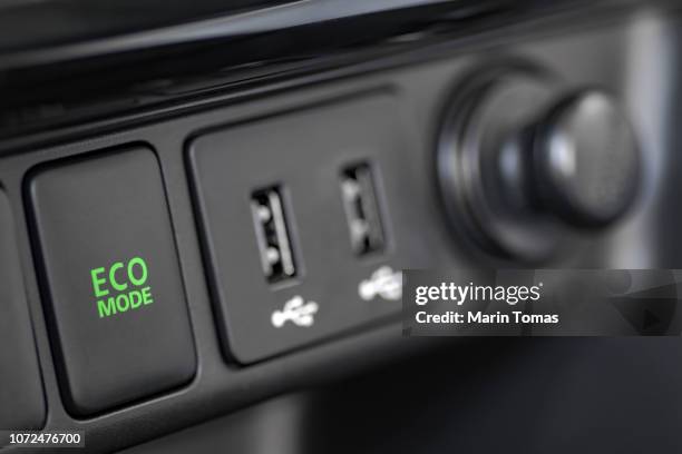 eco driving and usb ports - car adapter stock pictures, royalty-free photos & images