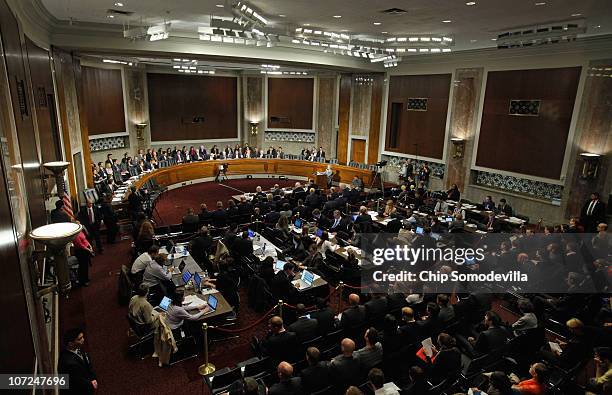 Packed room hosts a hearing of the Senate Armed Services Committee about the military's "don't ask, don't tell" policy on Capitol Hill December 2,...