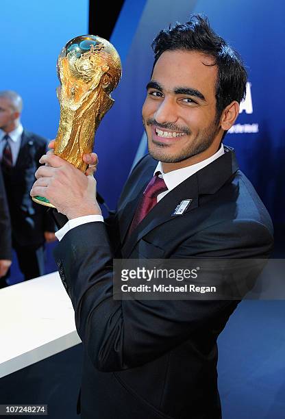 Sheikh Mohammes bin Hamad Al-Thani, the Chairman of the Qatar bid holds the World Cup after winning the right to host the 2022 World Cup during the...