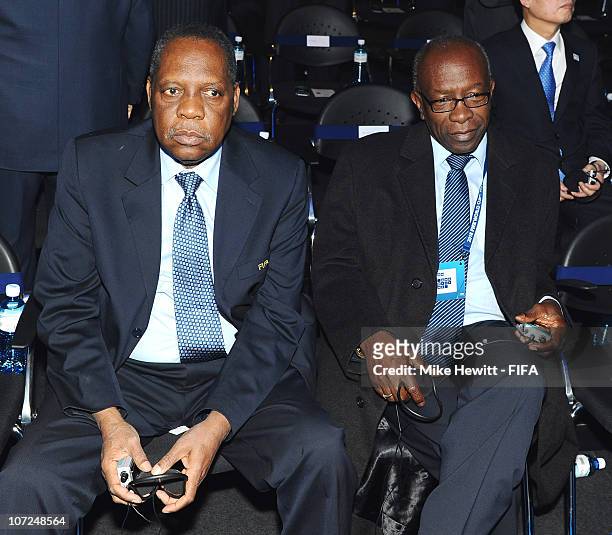 Executive Committee members Issa Hayatou and Jack Warner take their seats for the announcements of the winners of the 2018 and 2022 FIFA World Cups...