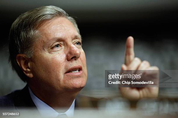 Senate Armed Services Committee member Sen. Lindsey Graham questions witnesses during a hearing about the military's "don't ask, don't tell" policy...