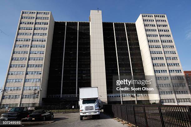 Moving truck is parked in front of 1230 N. Burling St., the last occupied high-rise in the Cabrini-Green public housing complex on December 2, 2010...
