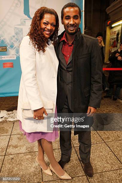 Cacau and his wife Tamara Barreto attend the premiere of the football documentary 'Transnationalmannschaft' at the Metropol cinema on December 2,...