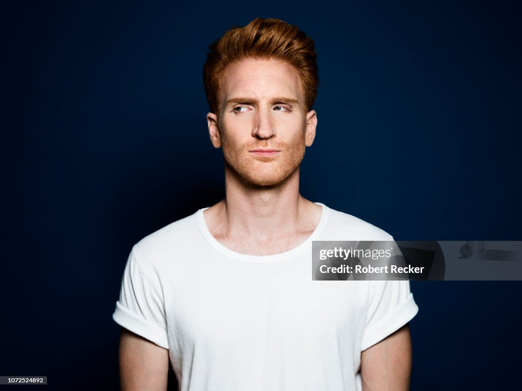 Critical redhaired man