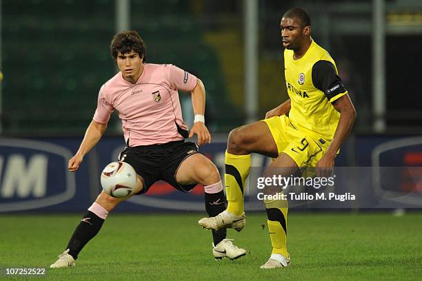 Ezequiel Munoz of Palermo and Leony Leonard Kweuke of Sparta Prague compete for the ball during the Uefa Europa League Group F match between Palermo...