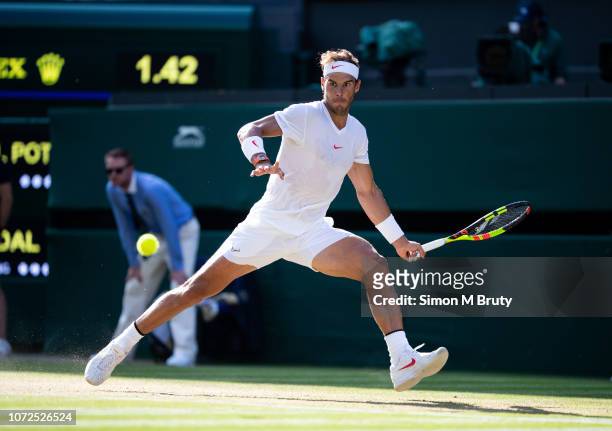 Rafael Nadal from Spain in action against Juan Martin Del Potro from Argentina during The Wimbledon Lawn Tennis Championship at the All England Lawn...