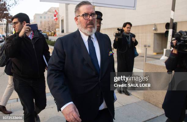 Robert Driscoll, lawyer for Russian national Maria Butina, leaves the US District Court in Washington, DC, December 13 after Butina plead guilty to...