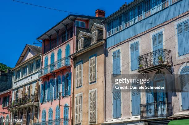 france, occitanie region, hautes-pyrenees, spa town of bagneres-de-bigorre, line of "bigourdane" houses (houses with a typical architecture style from the bigorre region) boulevard carnot - hautes pyrénées stock pictures, royalty-free photos & images
