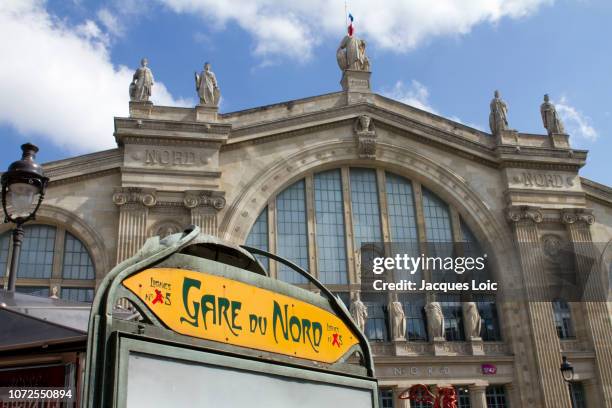 france, paris, department 75, 10th arrondissement, train station gare du nord, metro entrance and façade of the train station. - subway paris stock-fotos und bilder