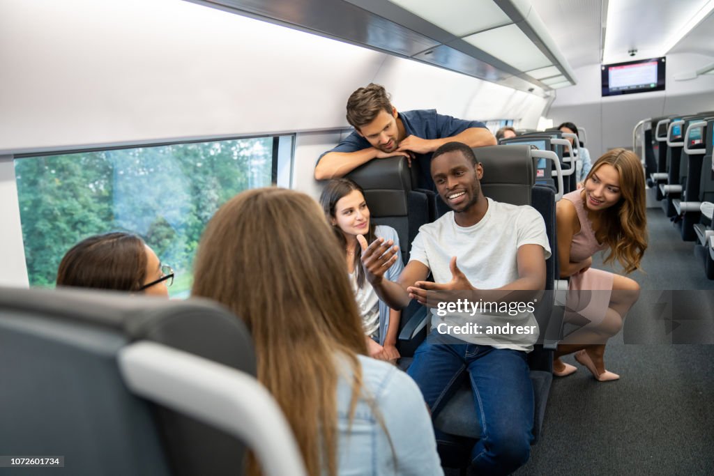 Friends Catching Train Happy Group Of Friends Traveling By Train High-Res Stock Photo - Getty ...