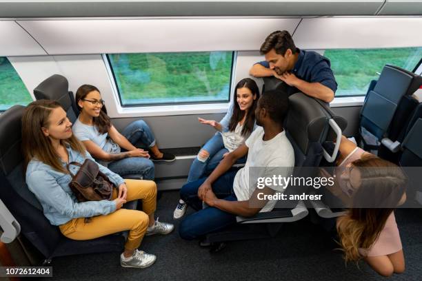 Friends Catching Train Comedy On A Station Platform Photos and Premium High Res Pictures ...