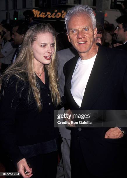 Malcolm McDowell and Kelley Kuhr during "Twister" Los Angeles Premiere at Mann Village Theatre in Westwood, California, United States.