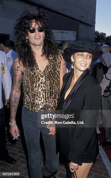 Tommy Lee and Heather Locklear during 1989 MTV Video Music Awards at Universal Amphitheater in Universal City, California, United States.
