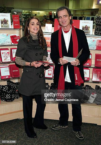 Her Majesty Queen Rania Al Abdullah of Jordan and RED co-founder Bobby Shriver make an appearence at the LeMarc's Hallmark Gold Crown Store on...