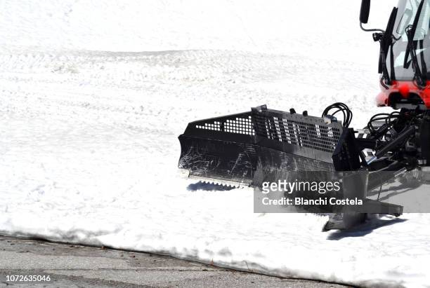snowplow in the snow in spring - snowplow stock-fotos und bilder