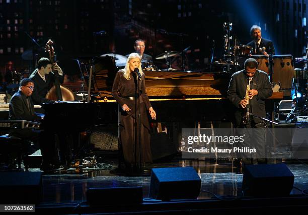 Musicians Herbie Hancock and Joni Mitchell on stage at The Thelonious Monk Institute of Jazz and The Recording Academy Los Angeles chapter honoring...