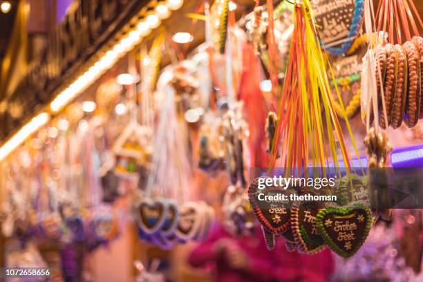 gingerbread on german christmas market with colorful background - bavaria christmas stock pictures, royalty-free photos & images