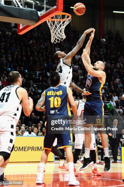 Marco Cusin and Carlos Delfino of Fiat competes with Amath M'Baye and Brian Qvale of Segafredo during the LBA Legabasket of Serie A1 match between...