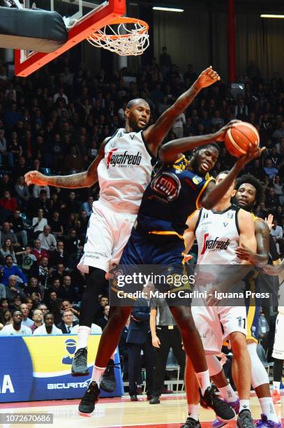 Mouhammadou Jaiteh competes with Amath M'Baye and Dejan Kravic of Segafredo during the LBA Legabasket of Serie A1 match between Virtus Segafredo...