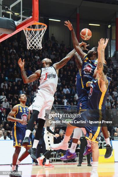 Amath M'Baye of Segafredo competes with Tony Carr and Jamal Taylor and Carlos Delfino of Fiat during the LBA Legabasket of Serie A1 match between...