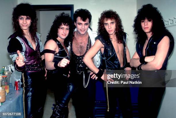 Portrait of the band Queensryche, left to right, Chris Degarmo, Michael Wilton, Geoff Tate, Scott Rockenfield, and Eddie Jackson at the Milwaukee...