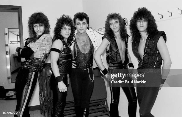 Portrait of the band Queensryche, left to right, Chris Degarmo, Michael Wilton, Geoff Tate, Scott Rockenfield, and Eddie Jackson at the Milwaukee...