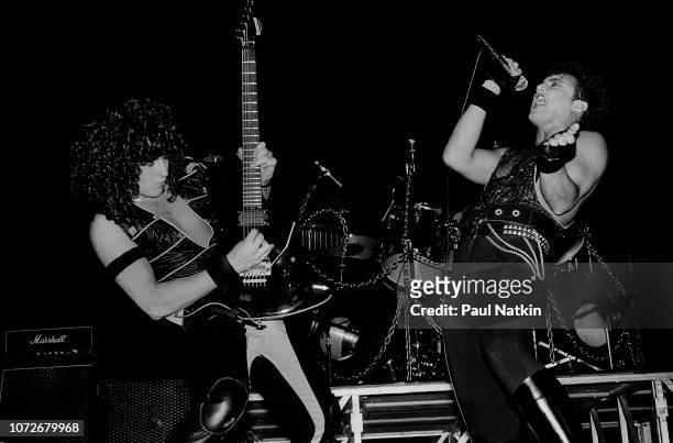 Guitarist Michael Wilton, left, and singer Geoff Tate of Queensryche perform at the Milwaukee Arena in Milwaukee, Wisconsin, December 30, 1984.