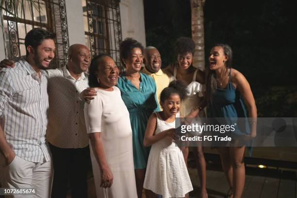 portrait of family celebrating new year - black family reunion stock pictures, royalty-free photos & images