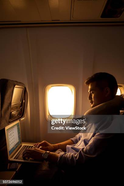young men by plane - neck pillow stock pictures, royalty-free photos & images