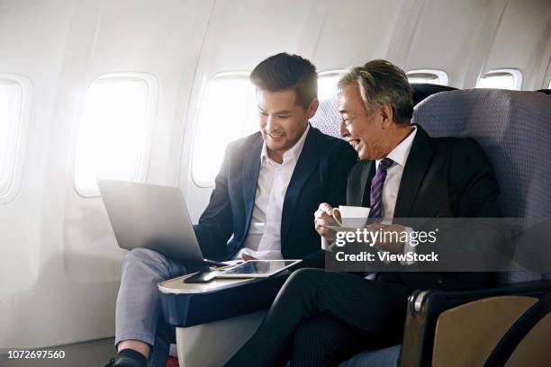 business people by plane - business jet stock-fotos und bilder