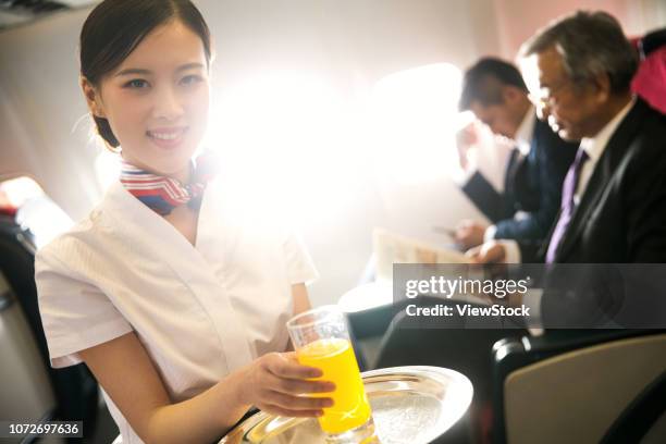 business people by plane - first class plane stock-fotos und bilder