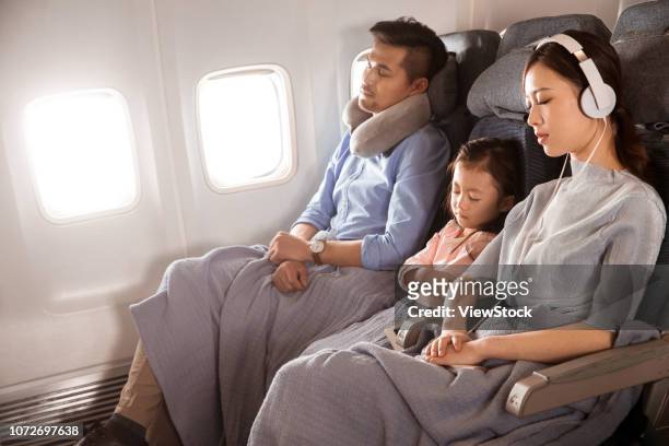 happy families by plane - first class plane stock-fotos und bilder