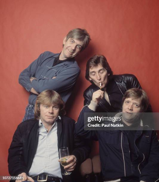 Portrait of the band Rockpile, clockwise from lower left, Dave Edmunds, Nick Lowe, Terry Williams, and Billy Bremner at the Riviera Theater in...