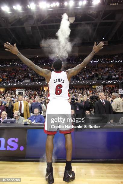 LeBron James of the Miami Heat prepares to play against the Cleveland Cavaliers on December 2, 2010 at Quicken Loans Arena in Cleveland, Ohio. NOTE...