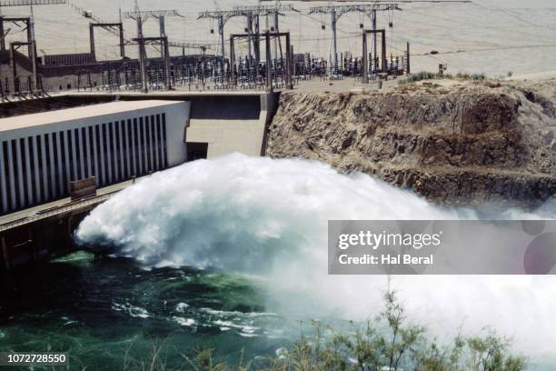 hydroelectric power water discharge - aswan dam stock pictures, royalty-free photos & images