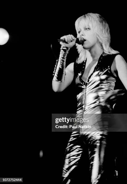 American musician Cherie Currie of the Runaways performs onstage in the midwestern United States, 1977.