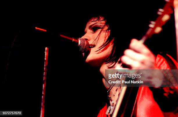American musician Joan Jett , of the Runaways, plays guitar as she performs onstage at the Aragon Ballroom, Chicago, Illinois, March 25, 1977.