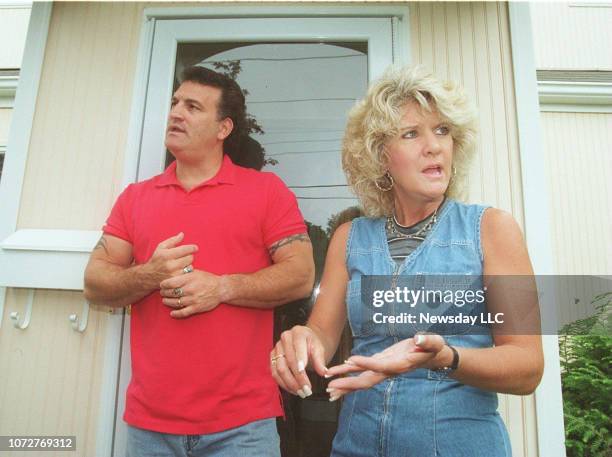 Joey Buttafuoco and his wife Mary Jo Buttafuoco in front of their Massapequa, New York home as they were interviewed by members of the media on July...