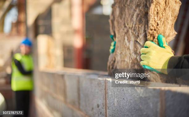 cavity insulation blanket - wall building feature stock pictures, royalty-free photos & images