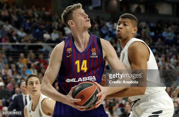 Artem Pustovyi of Barcelona Lassa in action against Edy Tavares of Real Madrid during the Turkish Airlines Euroleague basketball match between Real...