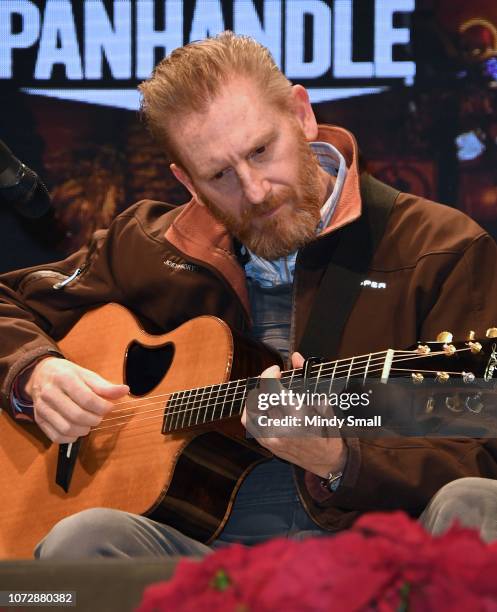 Rory Feek performs onsatge during the "Outside the Barrel" with Flint Rasmussen show during the National Finals Rodeo's Cowboy Christmas at the Las...