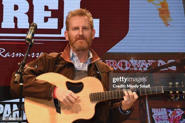 Rory Feek performs onsatge during the "Outside the Barrel" with Flint Rasmussen show during the National Finals Rodeo's Cowboy Christmas at the Las...