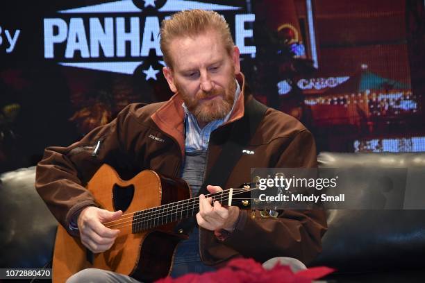 Rory Feek performs onsatge during the "Outside the Barrel" with Flint Rasmussen show during the National Finals Rodeo's Cowboy Christmas at the Las...