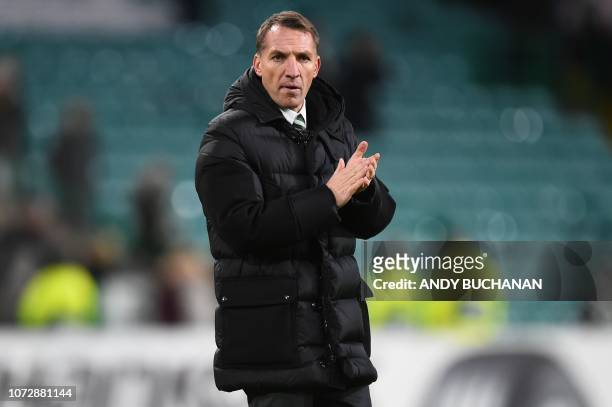 Celtic's Northern Irish manager Brendan Rodgers applauds the fans following the UEFA Europa League group B football match between Celtic and Salzburg...