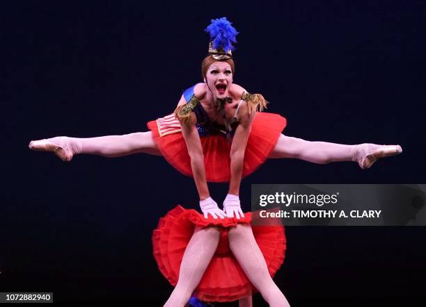 Dancers from Les Ballets Trockadero de Monte Carlo perform a scence from "Stars & Stripes Forever" during a dress rehearsal December 13, 2018 at the...